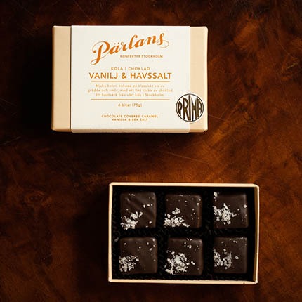 Pärlans kolor doppade i choklad med smak av vanilj och choklad. 6 st i en ask.